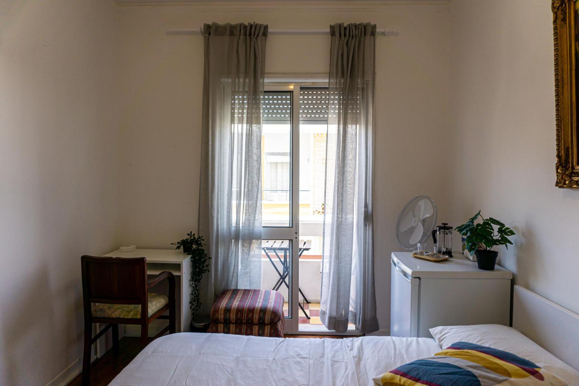 Alloggio in famiglia Aconchego De Quartos No Centro De